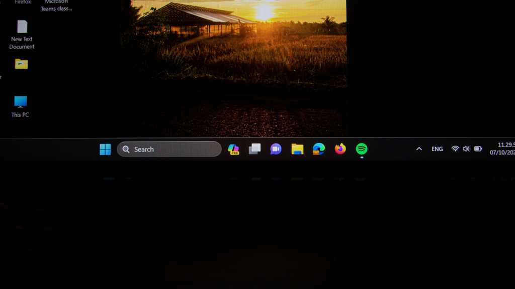 2385179469 Microsoft Windows 11 operating system on an Asus Zenbook laptop, start menu taskbar closeup. selective focus and blurry image